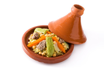 Traditional tajine with vegetables, chickpeas, meat and couscous isolated on white background