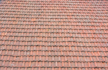 Roof tiles, Old retro rustic vintage red and orange roof tiles on the old house rooftop background