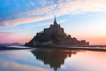 Fototapeta na wymiar Mont Saint-Michel view in the sunrise light. Normandy, northern France