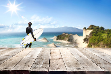 Desk of free space and summer blurred background of beach with sea 