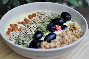 smoothie bowl,mango yogurt with fruit and almond