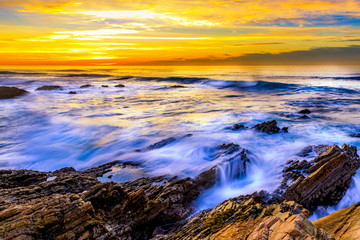 Waves over Rocks at Sunset at Beach, Ocean