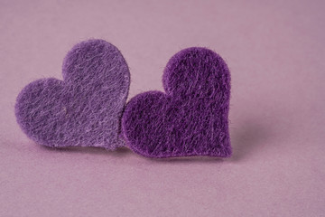 hearts on a purple background with copy space
