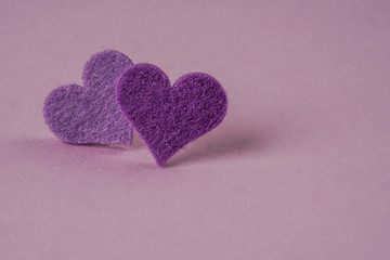 hearts on a purple background with copy space
