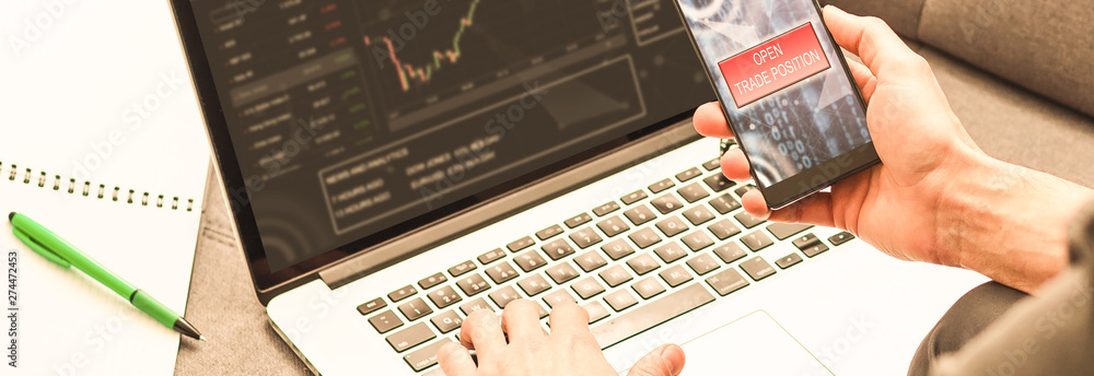 Aufkleber hand of trader holding mobile phone touch screen showing buy and sell in stock market order and blur