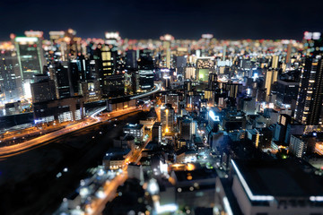 Fototapeta na wymiar Night skyline of Osaka city. Umeda Sky Building in Japan.