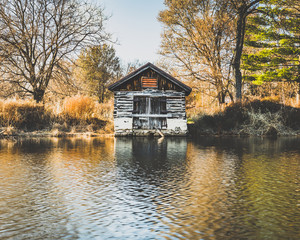 vintage boat house on the water