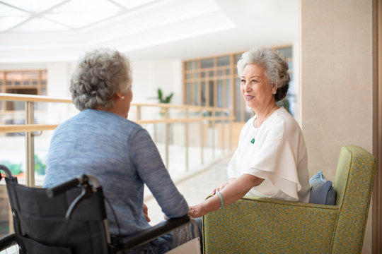 Senior women talking in nursing home