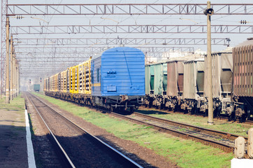 Fototapeta na wymiar Freight railway cars at the marshalling yard