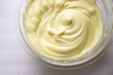 Yellow Meringue in Bowl Cooking step. Baking. Whipped. Ingredients. Cooking background. 