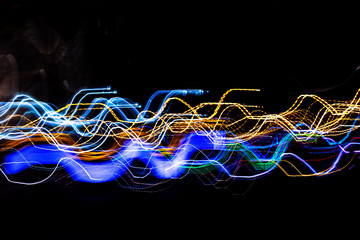 Night city lights background, long exposure. Abstract background.