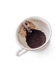  divination on coffee grounds in white cup around white
