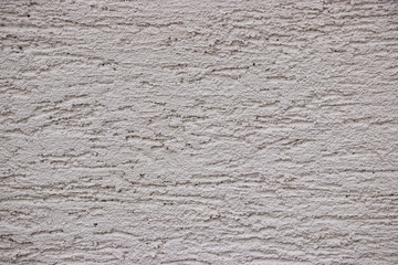 White painted rough plaster texture