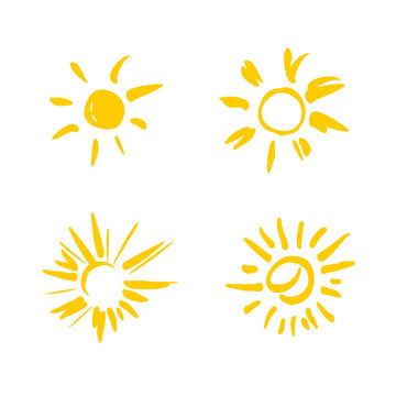 Four painted yellow suns. Vector solar symbols set.