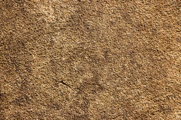 Brown rough granite wall texture