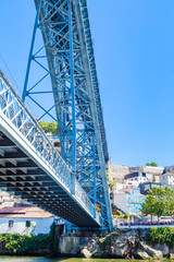 Fragment of famous steel bridge dom Luis above connects Old town Porto with Vila Nova de Gaia at river Douro, Portugal.