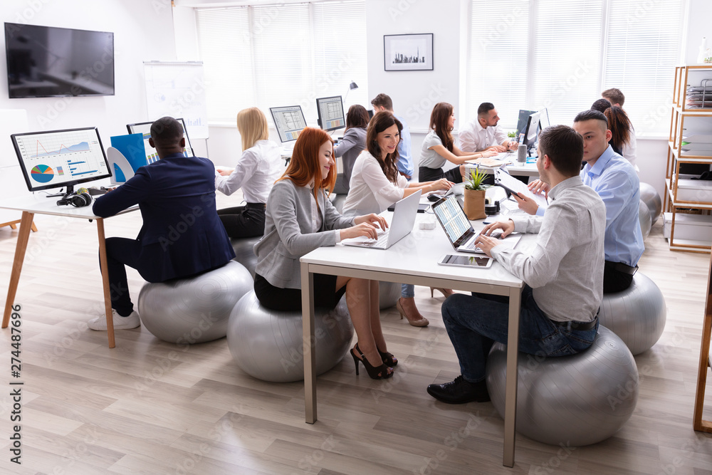 Poster group of businesspeople discussing while working in office