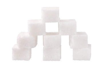 Sugar cubes put by a pyramid, isolated on white background