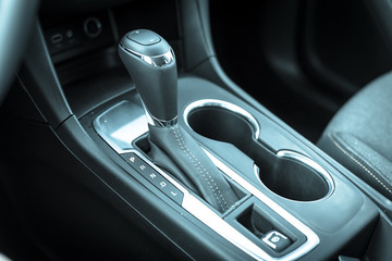 Filtered image automatic transmission in P mode inside modern car