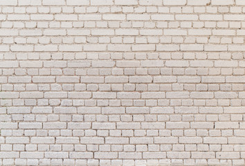 Fototapeta na wymiar High resolution full frame background of detailed old pale brick wall.