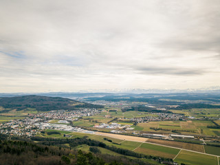 Aerial view urban sprawl Jura mountains in Switzerland
