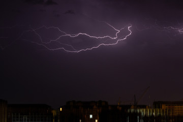 Lightning Bolt Across Night Sky. Lightning sky black. Lightning strikes against the black sky