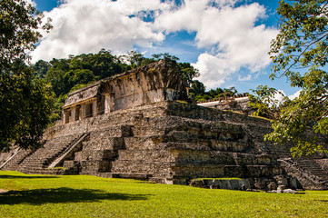 Fototapeta na wymiar Pyramids and ancient buildings in archaeological site of Palenque, Mexico