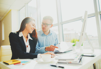 Businessman And Businesswoman Meeting In Modern Office