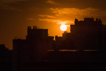 Fototapeta premium silhouette of city at sunset