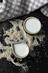 Sesame milk in a jug. Vegan drinks. Keto diet Keto drinks.