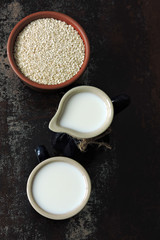 Sesame milk in a jug. Vegan drinks. Keto diet Keto drinks.