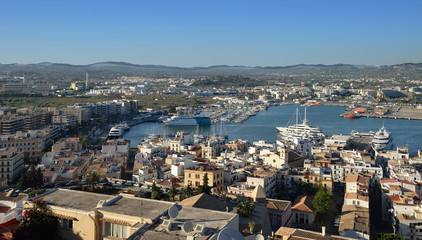 Fototapeta na wymiar Ibiza Town. Ibiza.Spain - 28 may 2019. Panoramic view from the walls of the castle di Eivissa to the port of Ibiza and the ferry