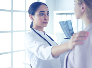Healthcare and medical concept - doctor with patient in hospital