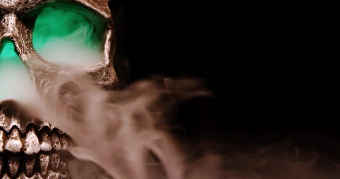 A Smoking Skull  with a color shifting glow only half shown.