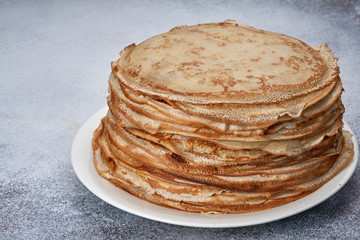fresh pancakes on a plate white background