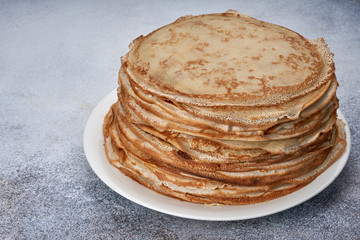 fresh pancakes on a plate white background