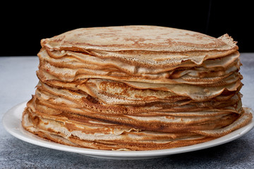 fresh pancakes on a plate white background