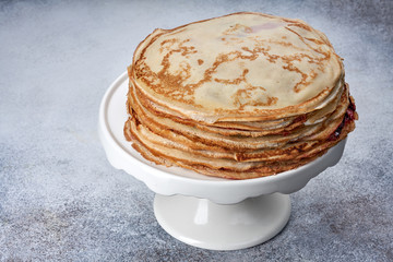 fresh pancakes on a plate white background