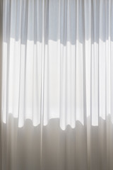 Curled white curtain