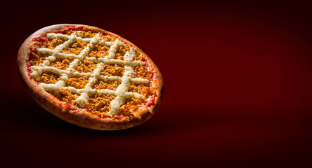 Pizza chicken and catupiry cheese on red background. close up. Traditional Brazilian Pizza