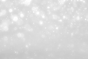 White and Silver lights on bokeh abstract background.