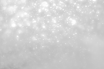 White and Silver lights on bokeh abstract background.