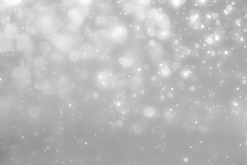 Fototapeta premium White and Silver lights on bokeh abstract background.