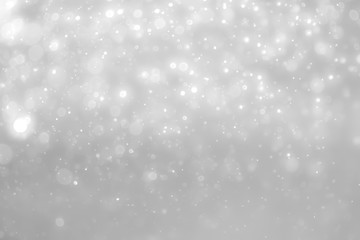White and Silver lights on bokeh abstract background.
