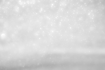 White and Silver lights on bokeh abstract background.