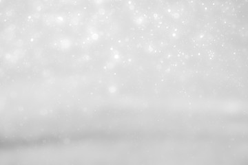 White and Silver lights on bokeh abstract background.