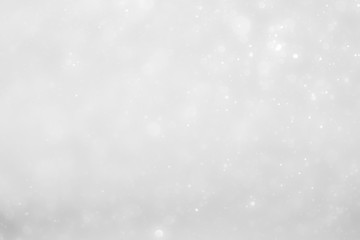 White and Silver lights on bokeh abstract background.