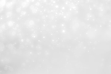 Fototapeta premium Białe i srebrne światła na streszczenie tło bokeh.