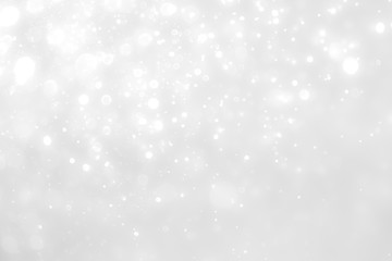 White and Silver lights on bokeh abstract background.