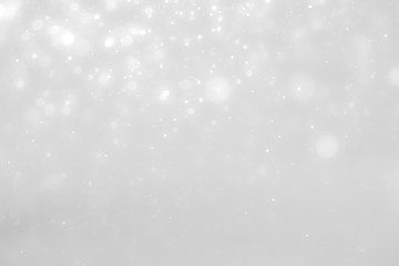 White and Silver lights on bokeh abstract background.